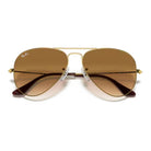 Ray-Ban - Ray-Ban RB3025 Aviator Gradient 001/51 – Occhiali da Sole Oro con Lenti Marroni Sfumate -